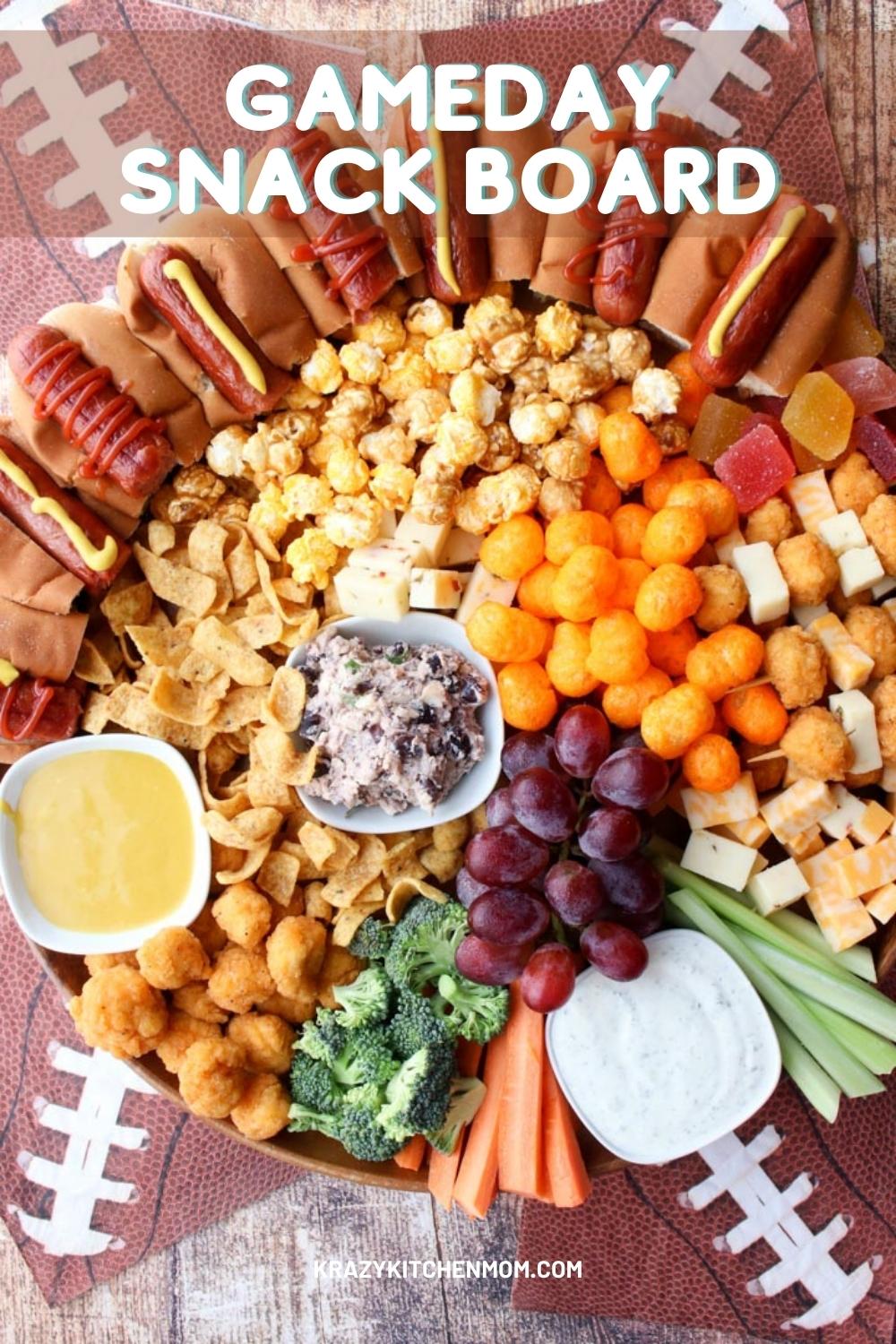 This Game Day Snack Board is a charcuterie board gone casual. It's filled with family-fun snacking finger foods that everyone loves. via @krazykitchenmom