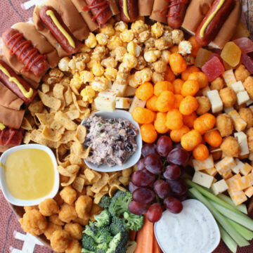 overhead shot of a board filled with snacks and finger foods