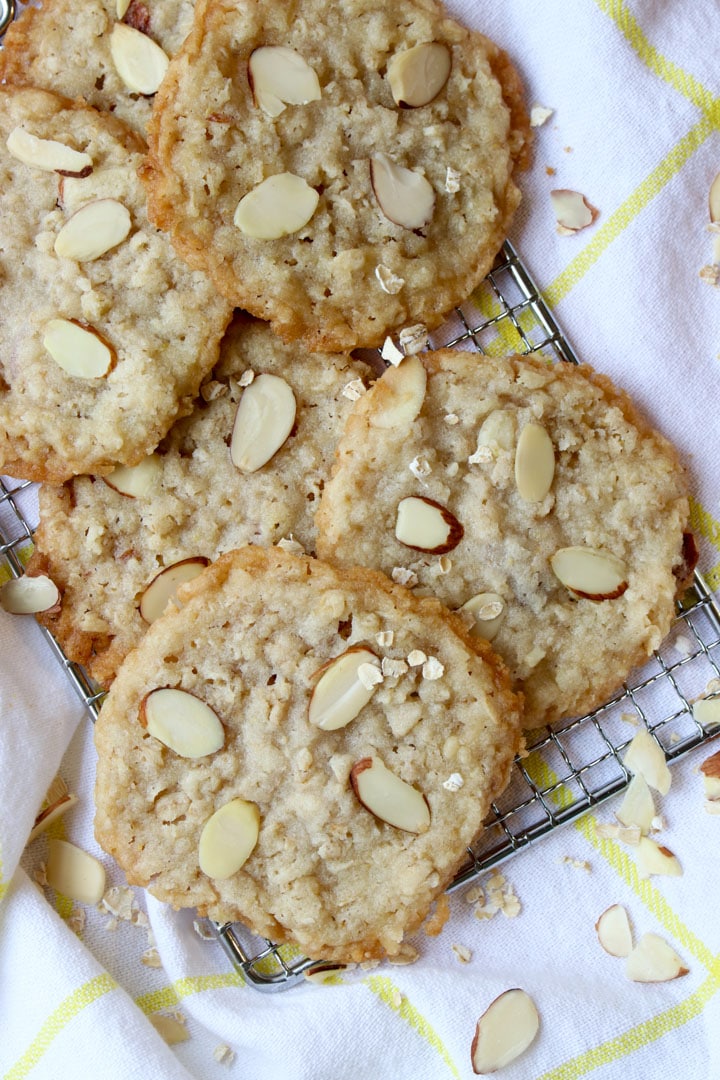 Small wire cooling rack snacked with lemon almond cookies