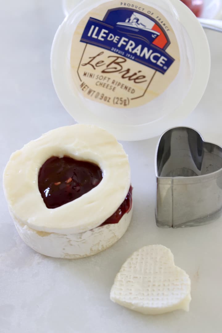 brie cheese with heart jam cut out