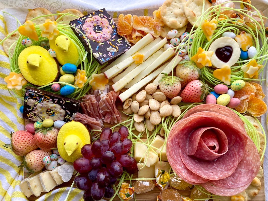 fun way to start the Easter celebration. This charcuterie board is filled with cheese, meat, nuts, fruit, and Easter candy. via @krazykitchenmom