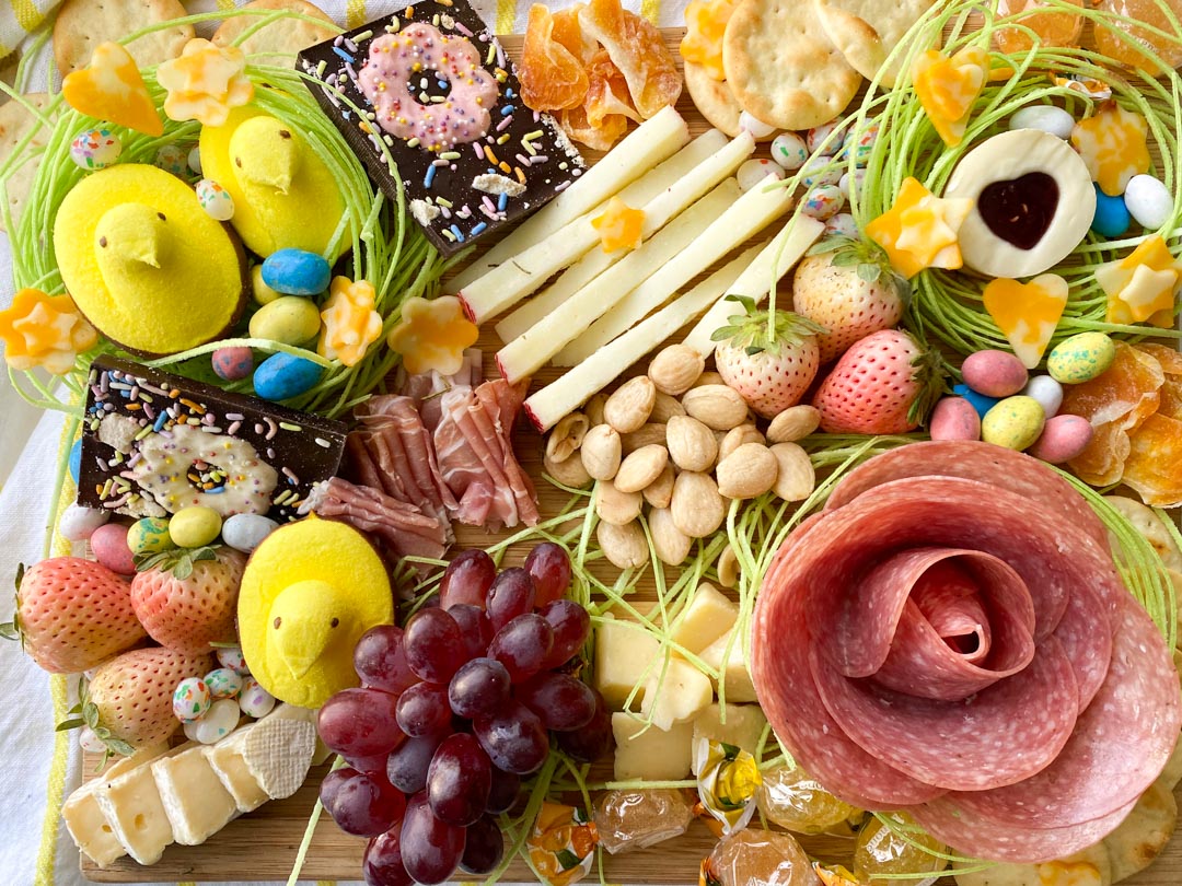 fun way to start the Easter celebration. This charcuterie board is filled with cheese, meat, nuts, fruit, and Easter candy. via @krazykitchenmom
