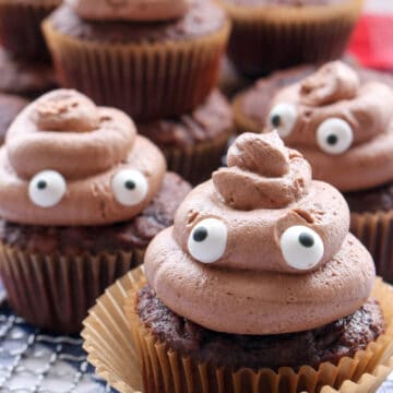 FOUR POOP EMOJI CUPCAKES