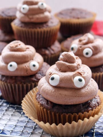 FOUR POOP EMOJI CUPCAKES