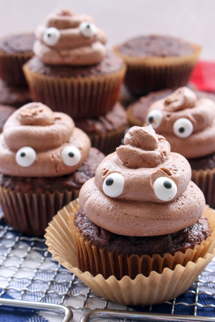 FOUR POOP EMOJI CUPCAKES