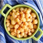 GOUDA CHEESE PUFFS IN A GREEN BOWL