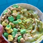 Green yogurt with lucky charms cereal