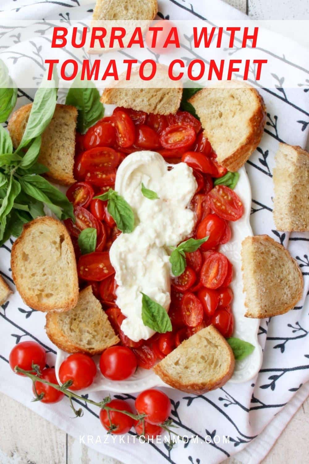 Summer tomatoes and burrata shine in this beautiful platter of creamy silky cheese with delicious slow-roasted tomatoes. via @krazykitchenmom