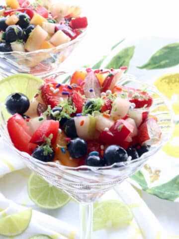 clear cocktail glass filled with fruit salad