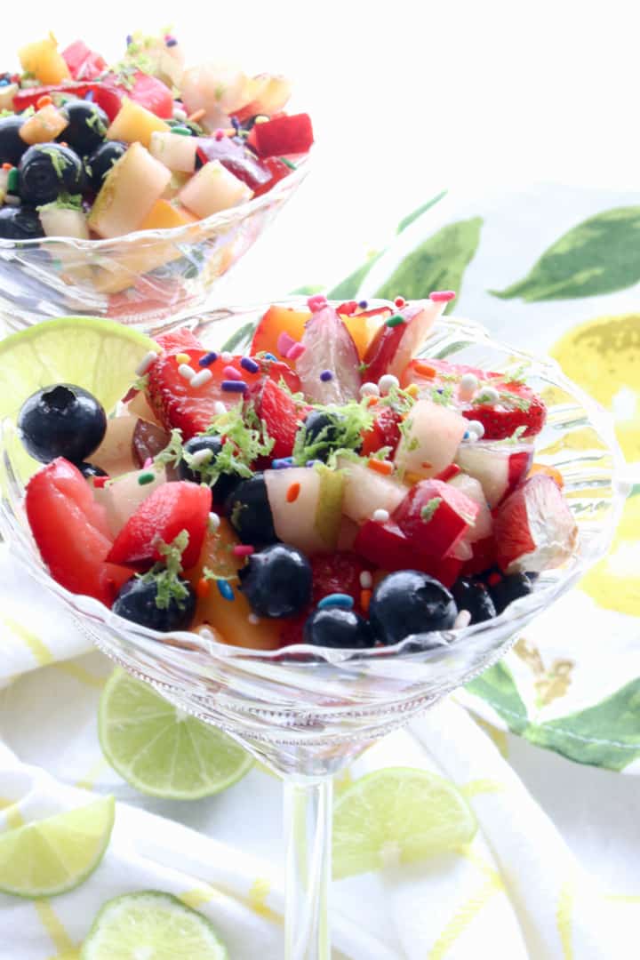 clear cocktail glass filled with fruit salad