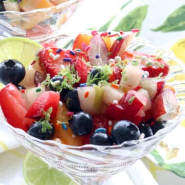 clear cocktail glass filled with fruit salad