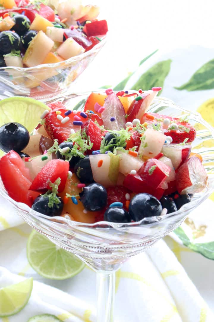 clear cocktail glass filled with fruit salad