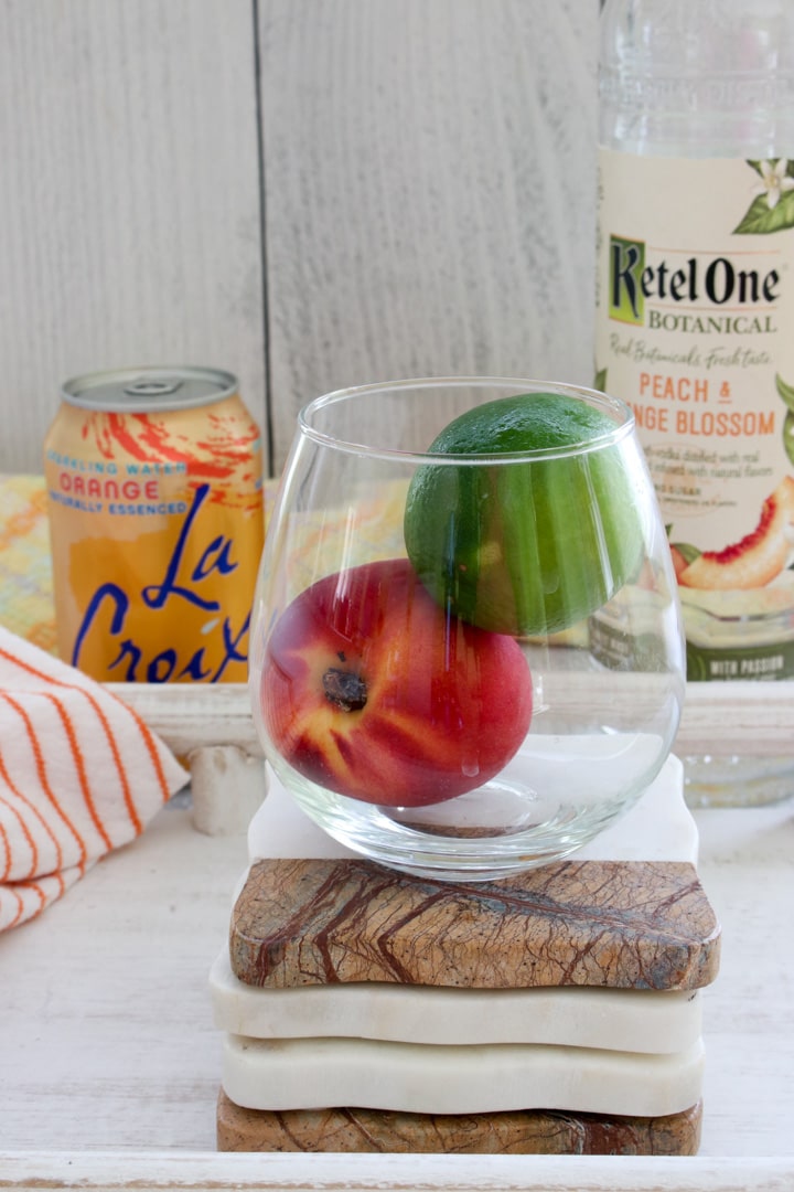 ingredients to make the sparkling peach cocktail