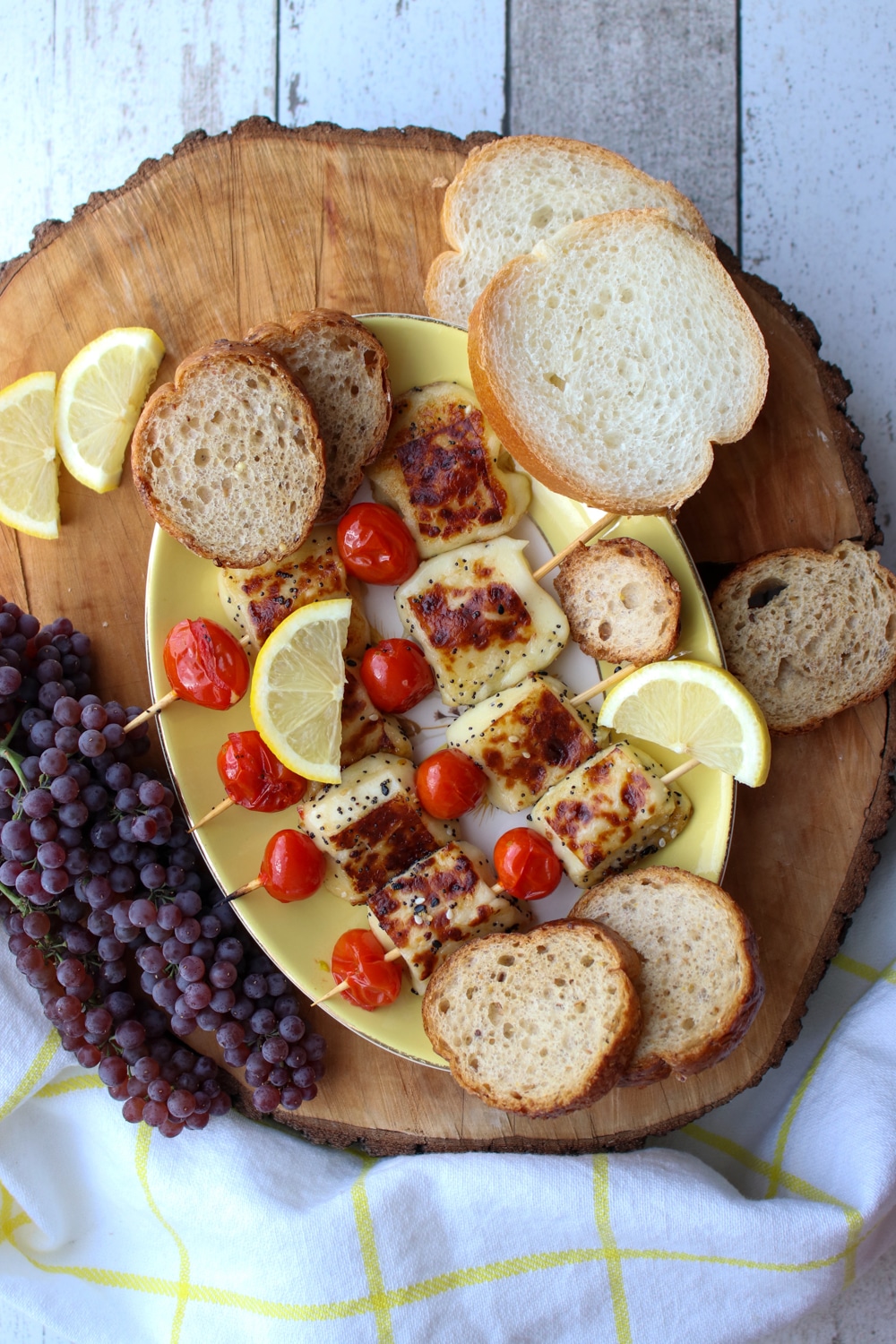 board with grilled bread cheese and tomatoes