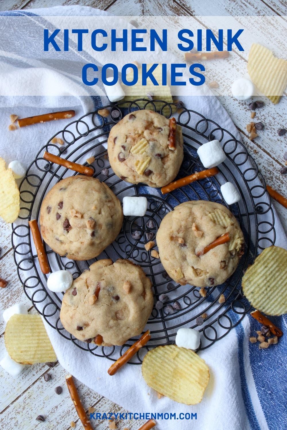 These cookies are sweet, salty, soft, crunchy, and loaded with chocolate and toffee bits.  They are a mix of a cookie and a candy bar. via @krazykitchenmom