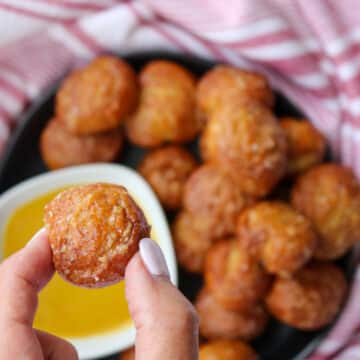 hand holding 1 pretzel bite