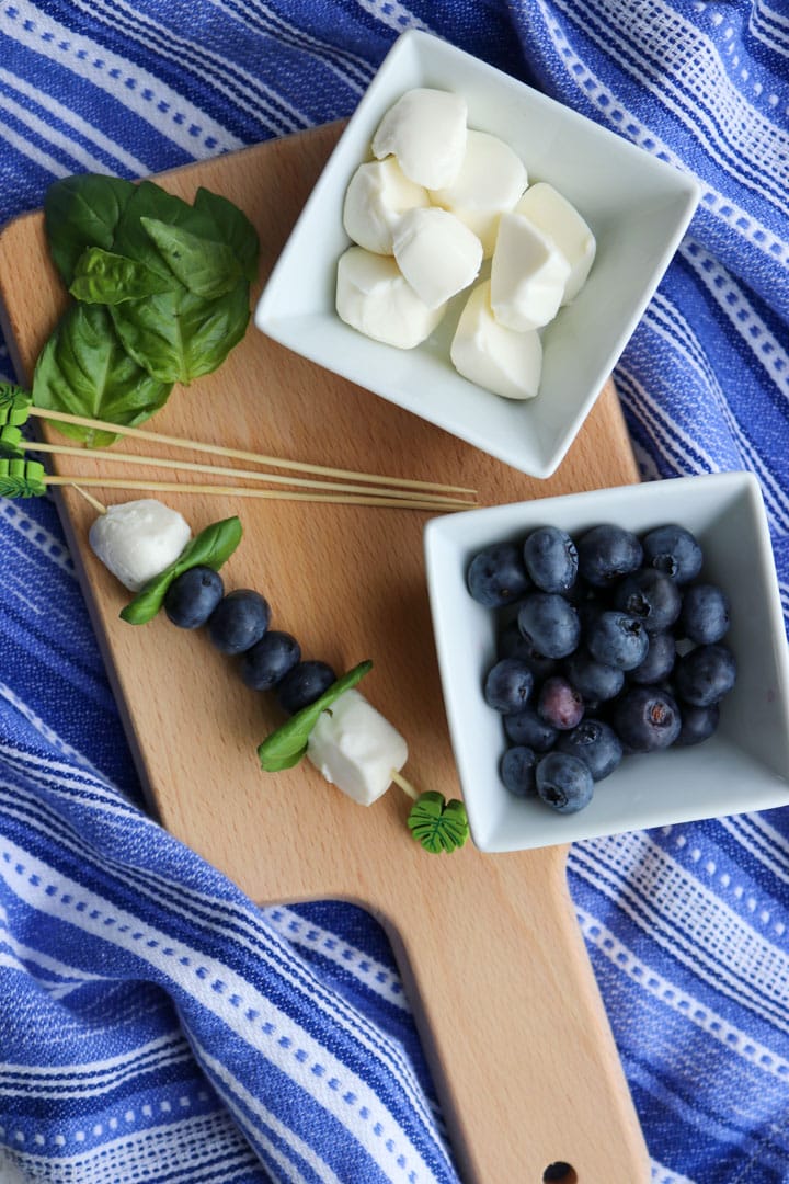 Photo showing how to make Blueberry Caprese Skewers