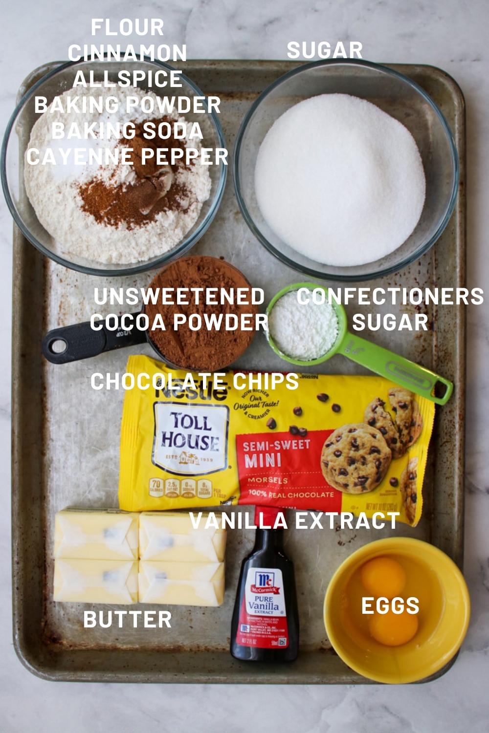 cookie sheet with the ingredients to make Mexican Hot chocolate cookies