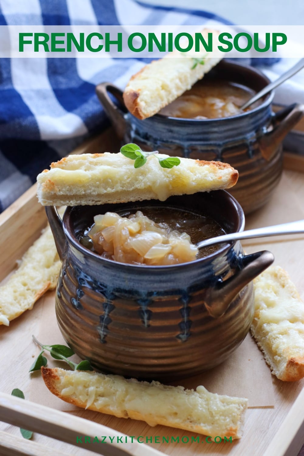 French Onion Soup is a beef-based soup filled with sweet soft cooked onions. It's topped with a cheesy baguette crouton. via @krazykitchenmom