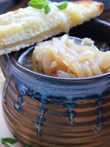 close up shot of a bowl of onion soup