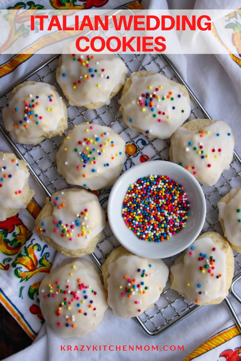 These cookies are soft and pillowy with an almond flavor. They are dipped in a creamy almond glaze and topped with fun and colorful sprinkles. via @krazykitchenmom