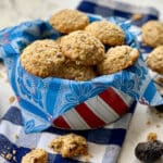 cookie tin filled with oatmeal fig pecan cookies