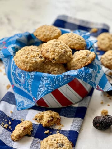 cookie tin filled with oatmeal fig pecan cookies