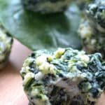 spinach pie bites on a board