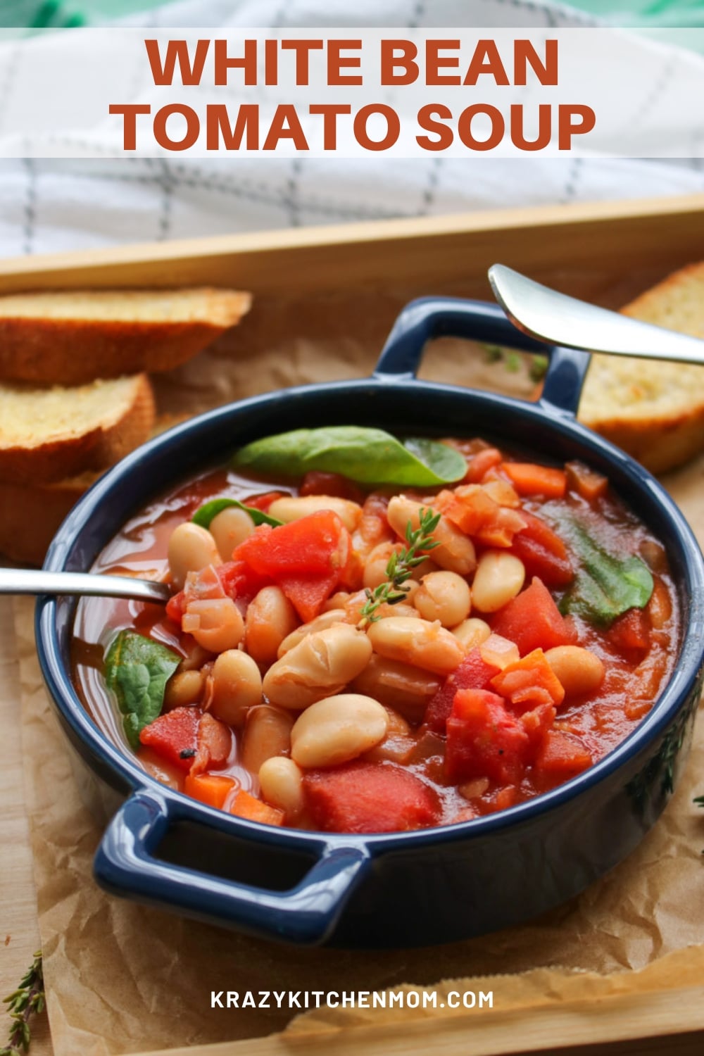 White Bean Tomato Soup is a hearty, low-calorie, low-carb, tomato-based soup. It's made with canned tomatoes, beans, carrots, spinach, herbs, and spices. via @krazykitchenmom