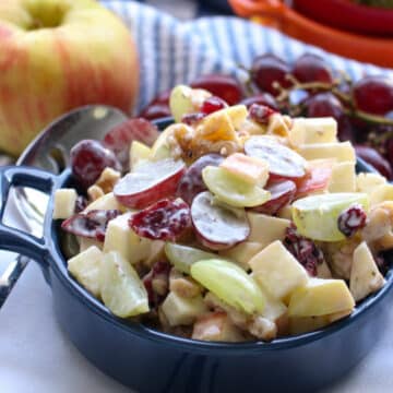 blue bowl filled with Waldorf Salad