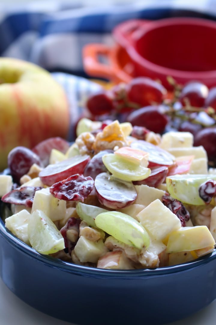 close up of blue bowl filled with Waldorf Salad
