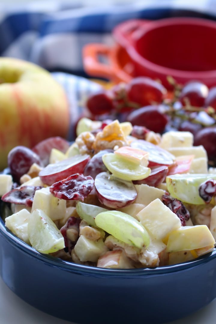 close up of blue bowl filled with Waldorf Salad