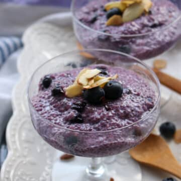 2 dessert dished filled with purple chia pudding