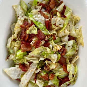 large bowl of cabbage and bacon cooked