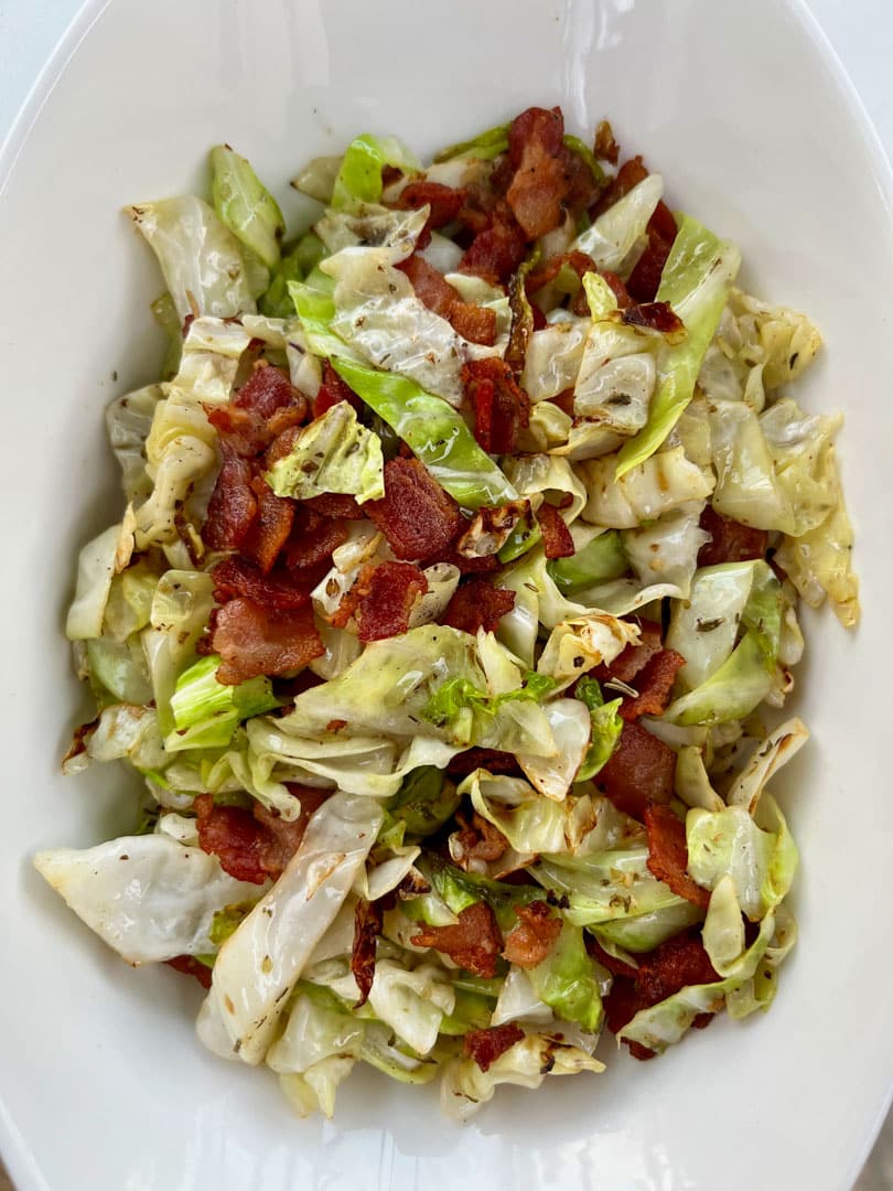 large bowl of cabbage and bacon cooked