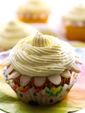 lemon cupcake with almonds around it