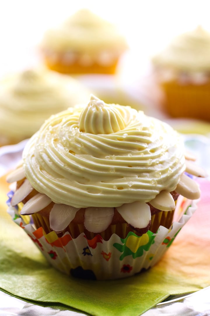 lemon cupcake with almonds around it 