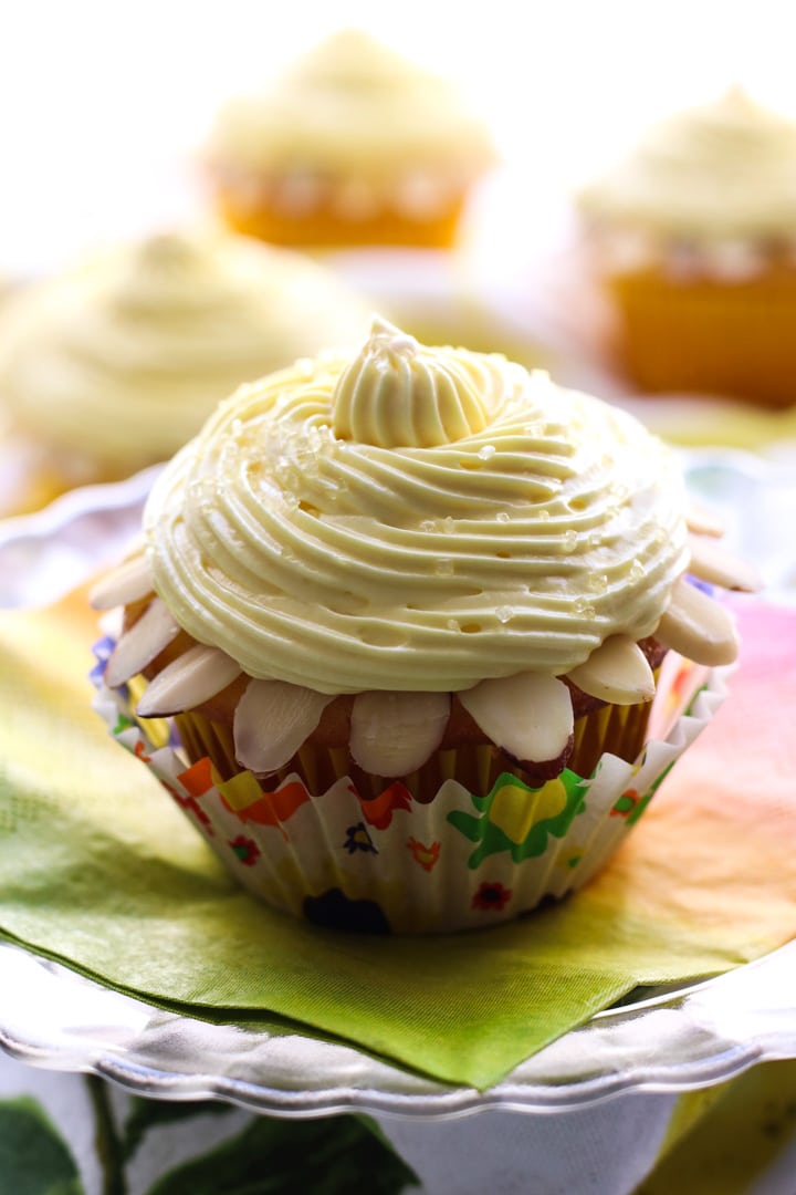 lemon almond cupake on a colorful napkin