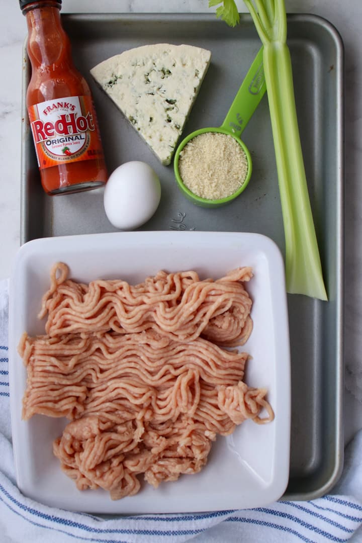 tray of ingredient to make buffalo chicken meatballs