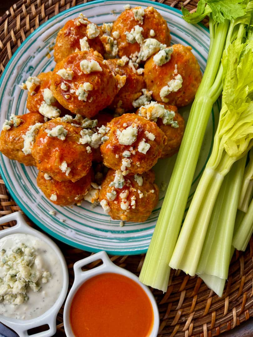 buffalo chicken meatballs with celery, blue cheese dressing and sauce