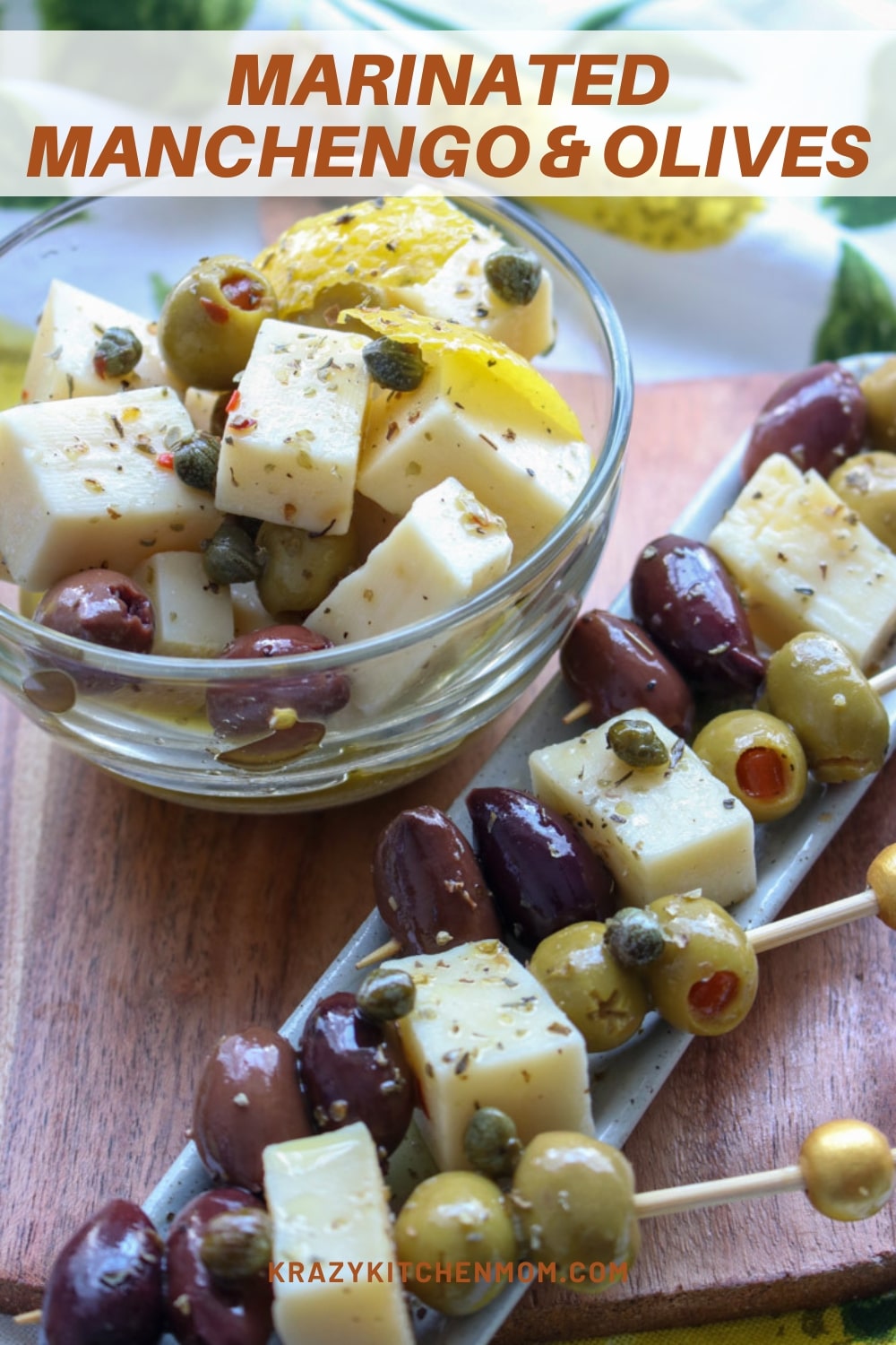 Elevate your snack and appetizers with a playful and zesty jar of marinated Manchego and olives. via @krazykitchenmom