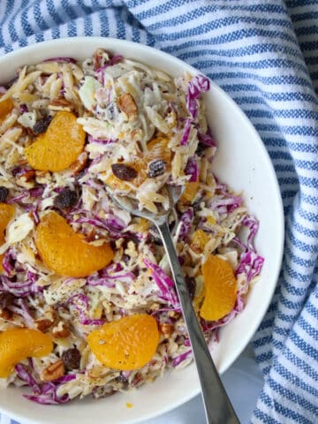 Bowl of creamy orzo coleslaw