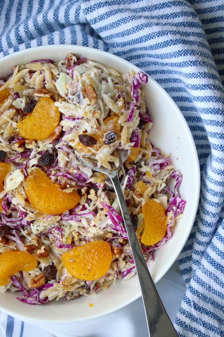 Bowl of creamy orzo coleslaw