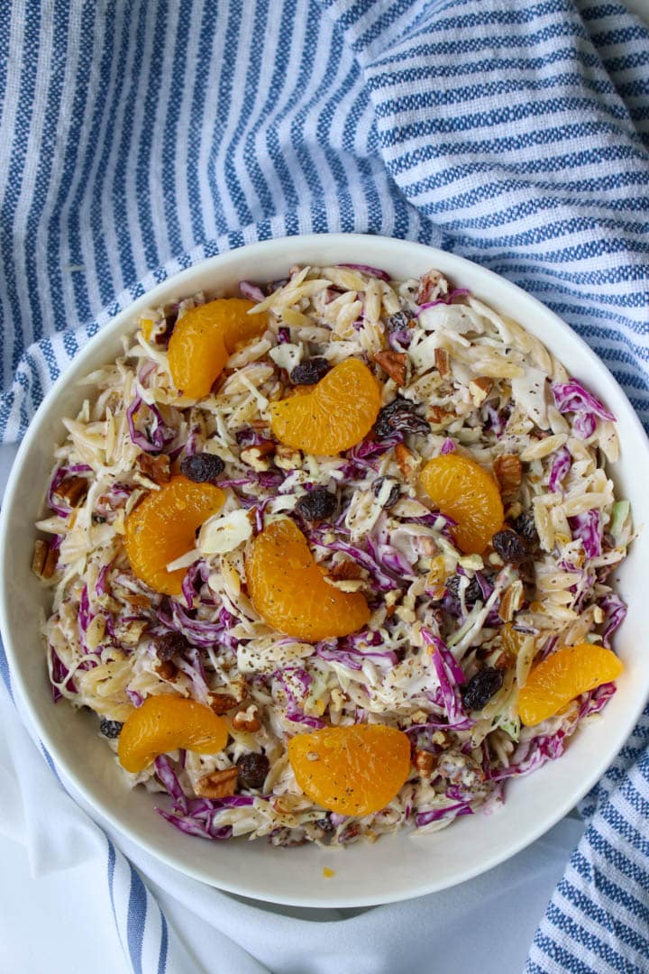 Bowl of creamy orzo coleslaw