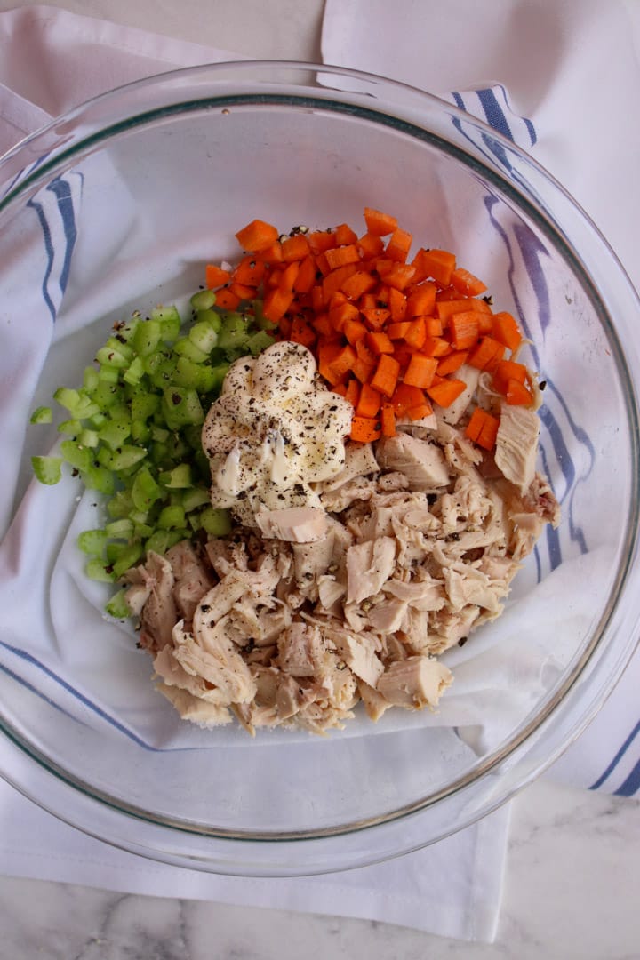 ingredients for chicken salad in a bowl