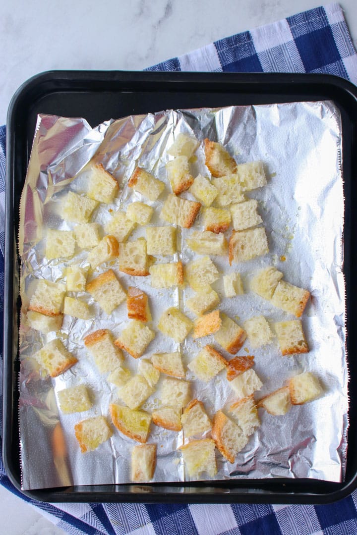 HOMEMADE CROUTONS ON A BAKING SHEET