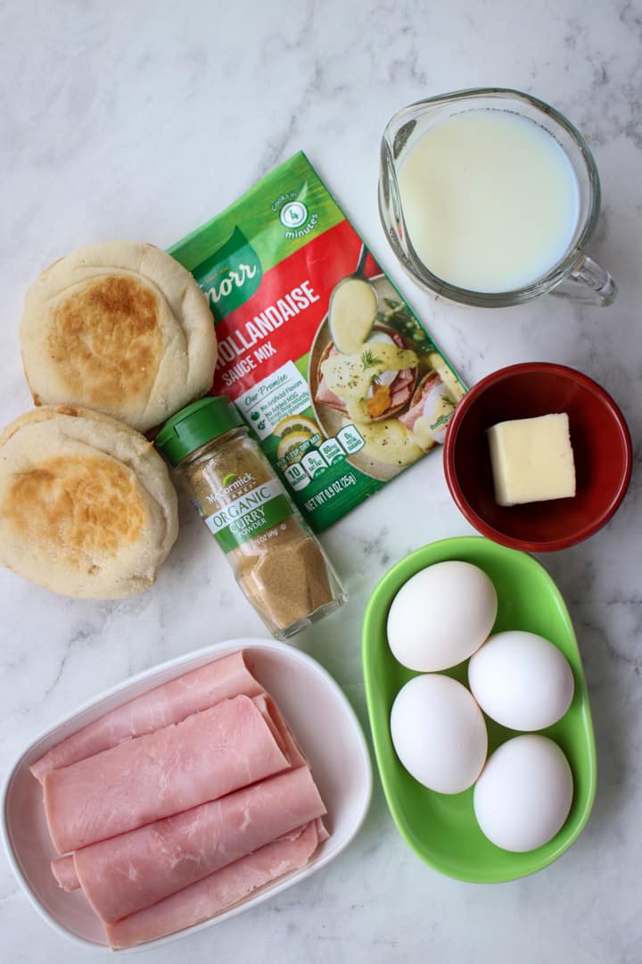 Ingredients to make easy eggs benedict with curried hollandaise