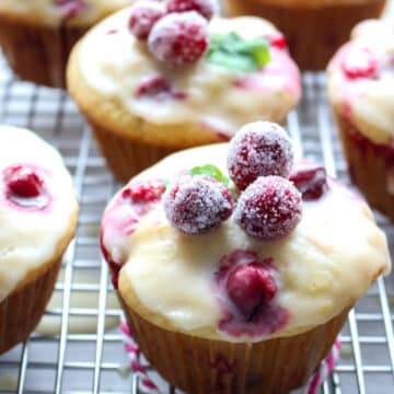 cranberry orange muffins on a rack