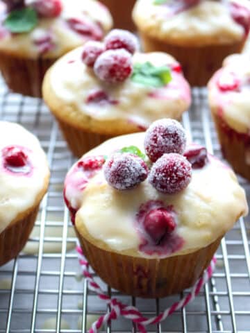 cranberry orange muffins on a rack