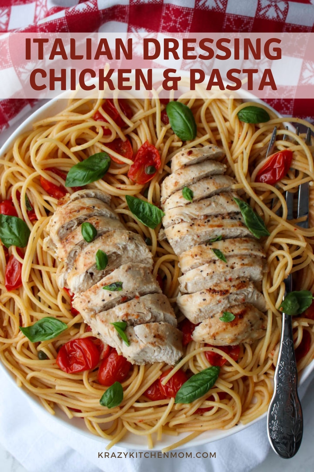 Juicy chicken and tomatoes marinated and baked in a zesty Italian dressing served over spaghetti deliver a burst of flavor with every bite. via @krazykitchenmom